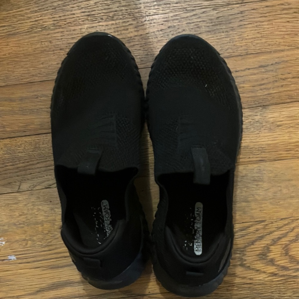 sketchers black memory foam slip ons